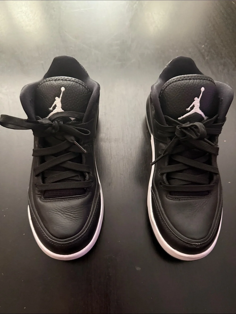 Jordan Black and White Low-Top Basketball Sneakers